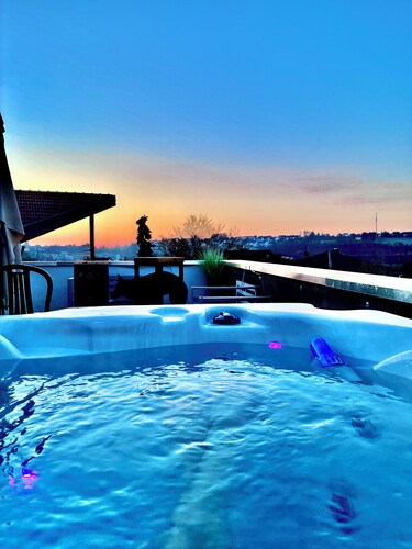 Mediterranean vacation rental with a hot tub and panoramic views