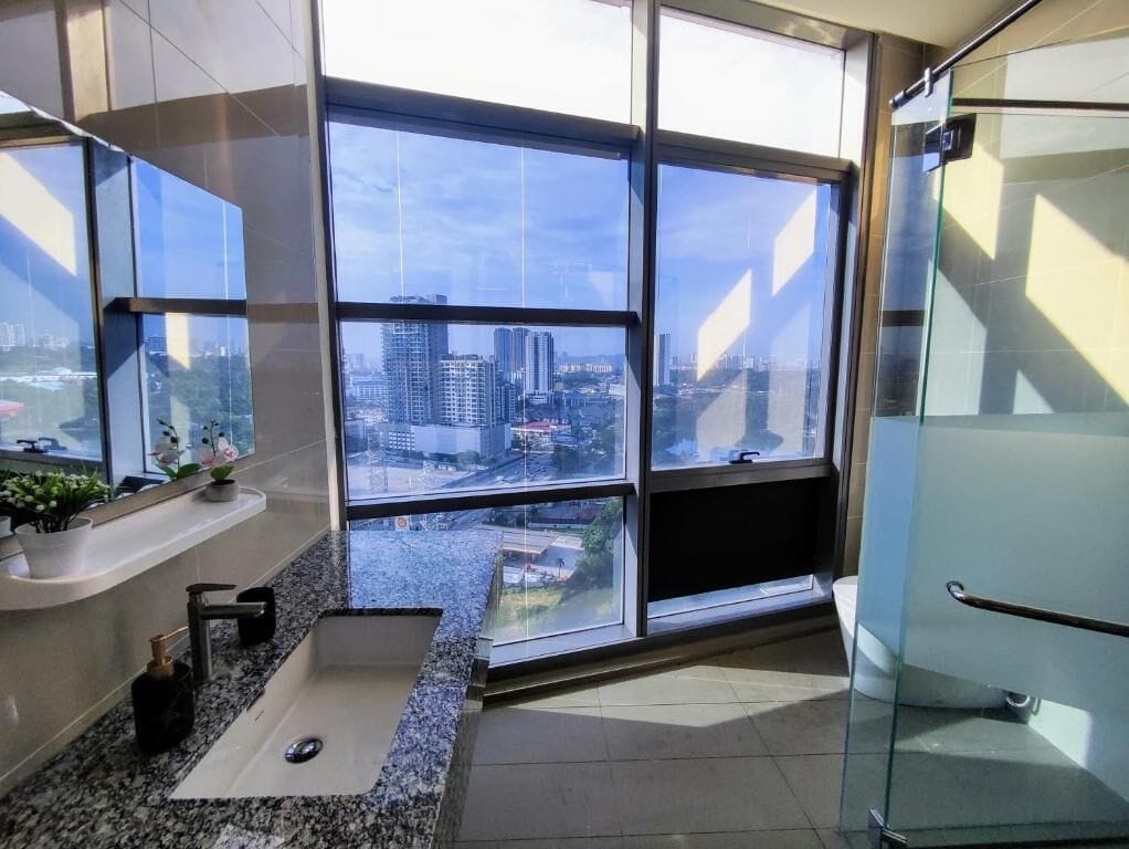Combined shower/tub, slippers, towels, soap