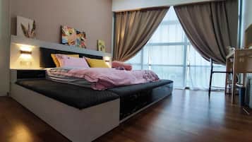 Family Condo, 4 Bedrooms, Balcony, City View | Blackout drapes, iron/ironing board, WiFi (free)