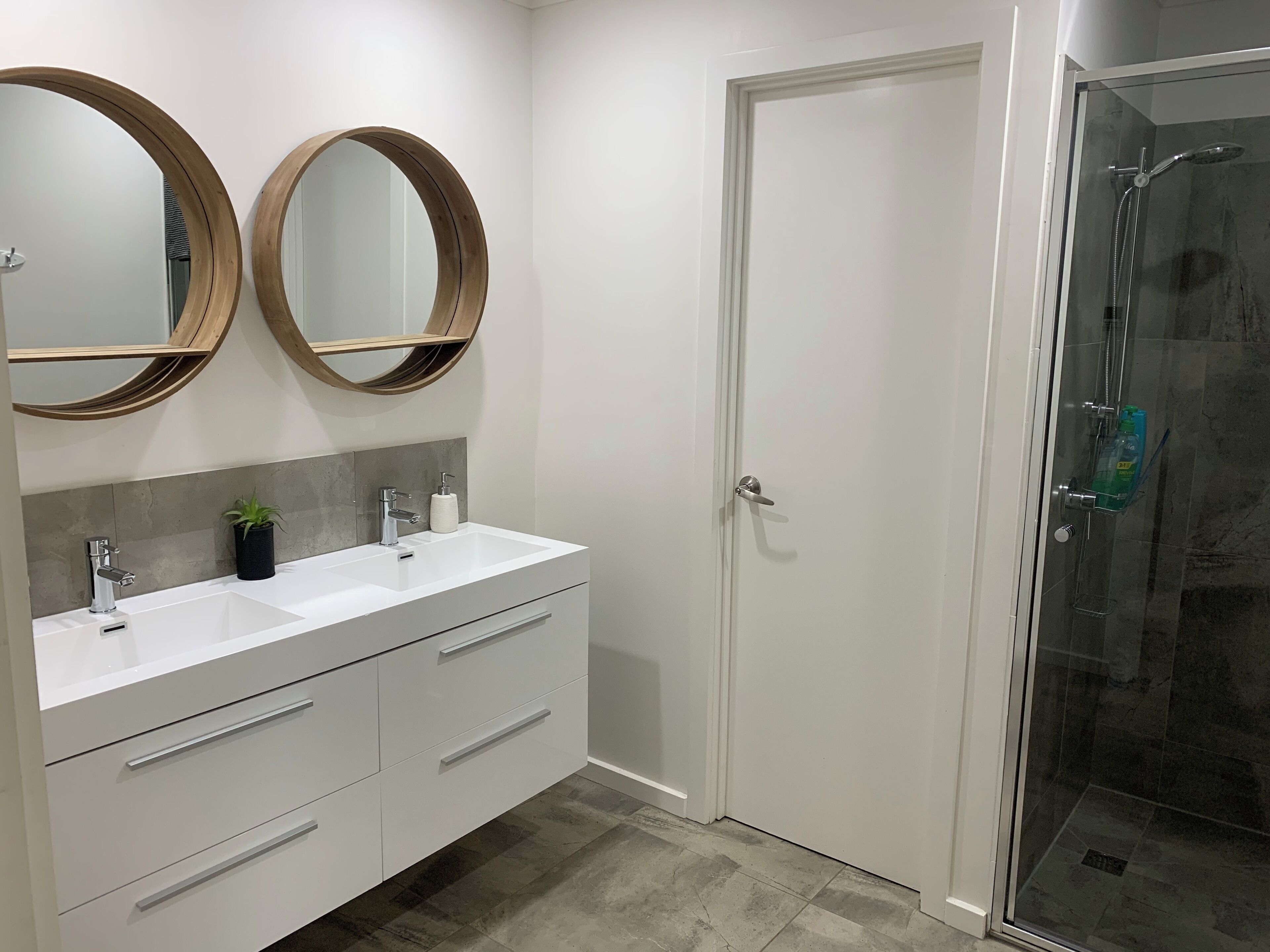Shower, hair dryer, soap, toilet paper