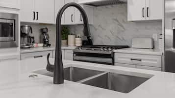 Coffee/tea maker, fridge, microwave, oven