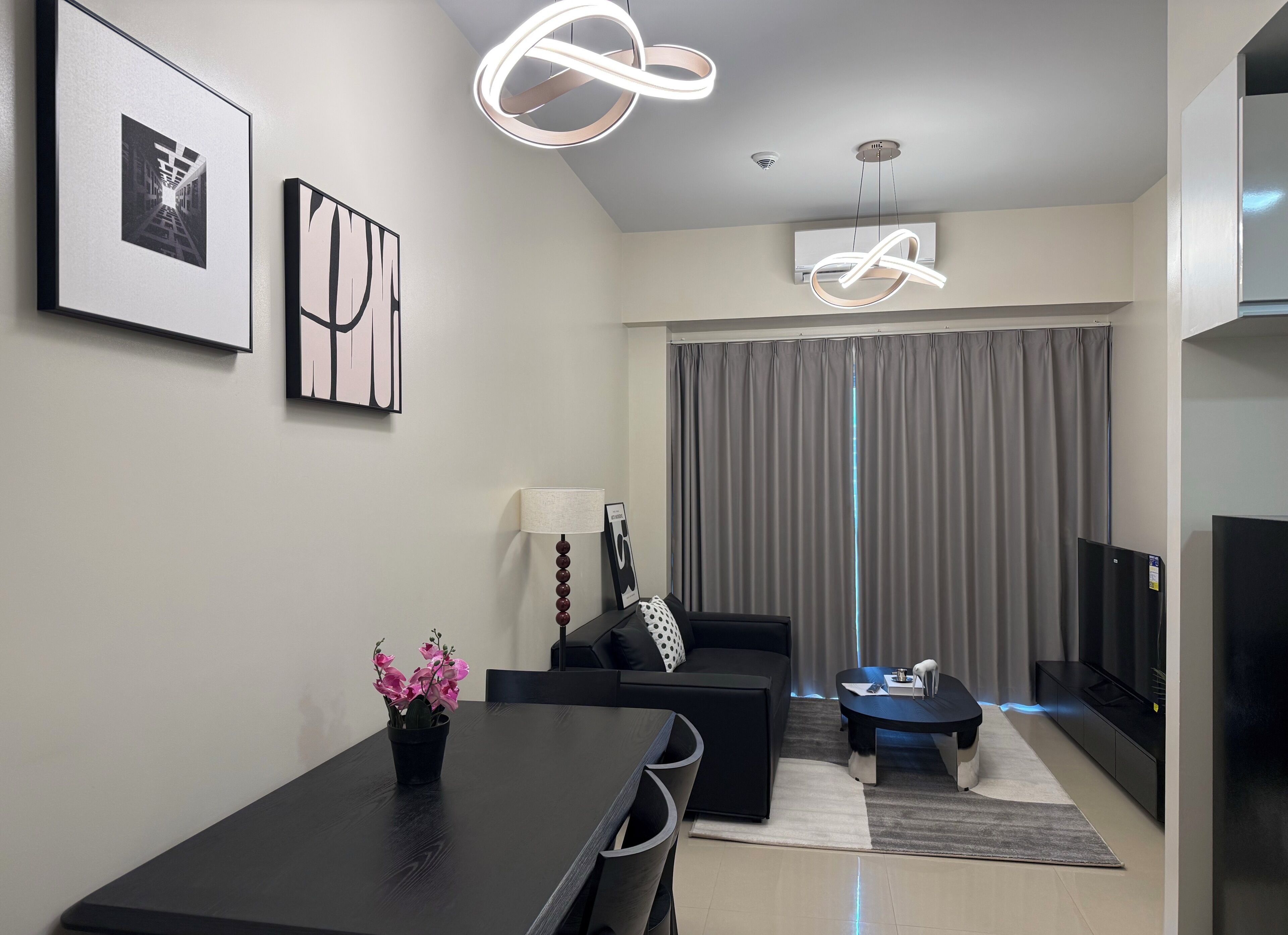Departamento Confort, vista a la alberca | Área de sala de estar