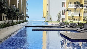 Outdoor pool, open 8:00 AM to 8:00 PM, sun loungers