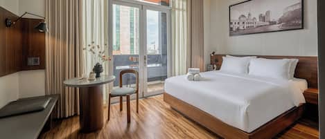 Deluxe Room, City View | In-room safe, desk, laptop workspace, blackout curtains
