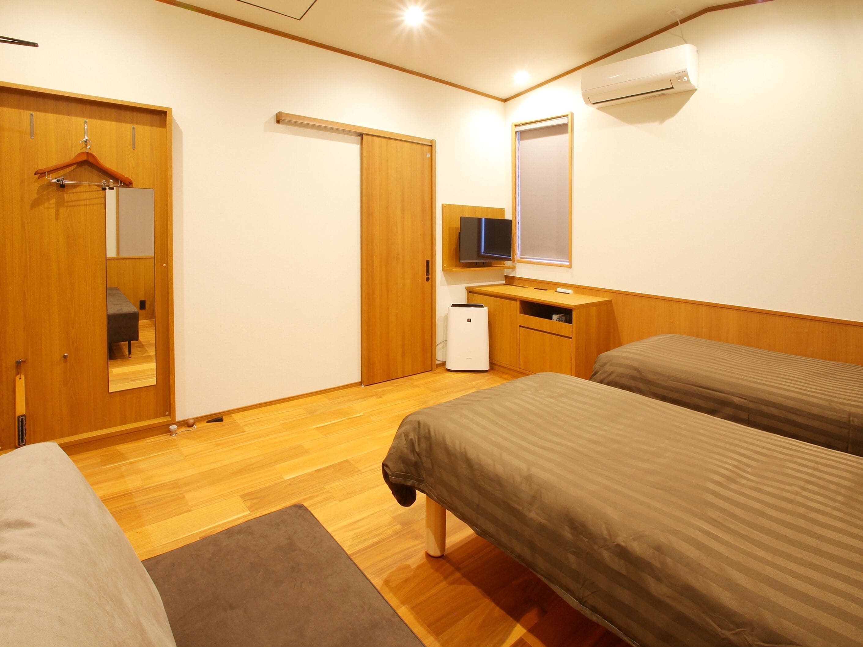 Chambre Confort avec lits jumeaux (with shower booth)