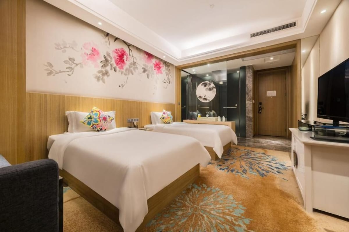 Premium bedding, down comforters, memory foam beds, minibar (free items)