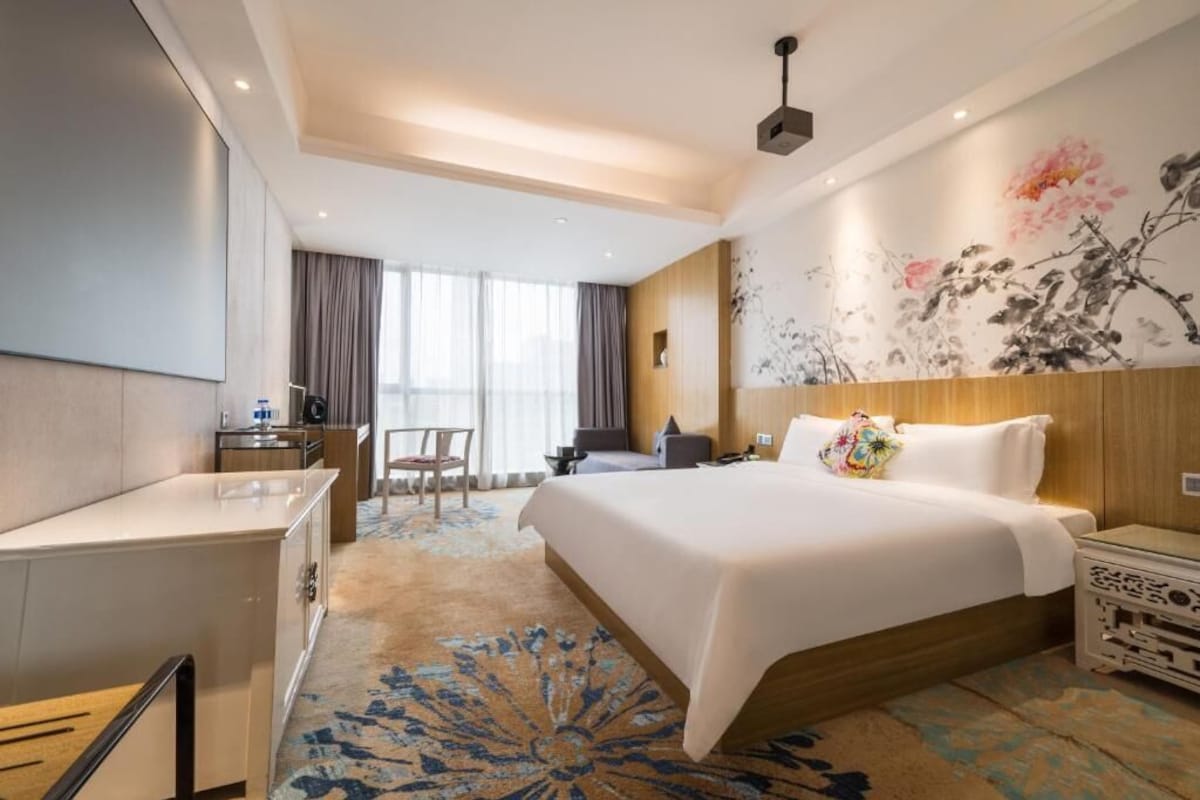 Premium bedding, down comforters, memory foam beds, minibar (free items)