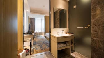 Premium bedding, down duvets, memory-foam beds, free minibar