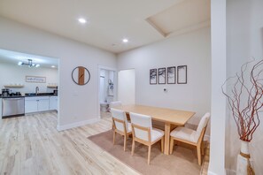 A modern kitchen with white cabinets and a built-in oven. - 7 Mi to Roaring River State Park! Gem w/ Fire Pit (Cassville)