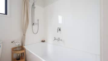 Shower, towels, soap, toilet paper