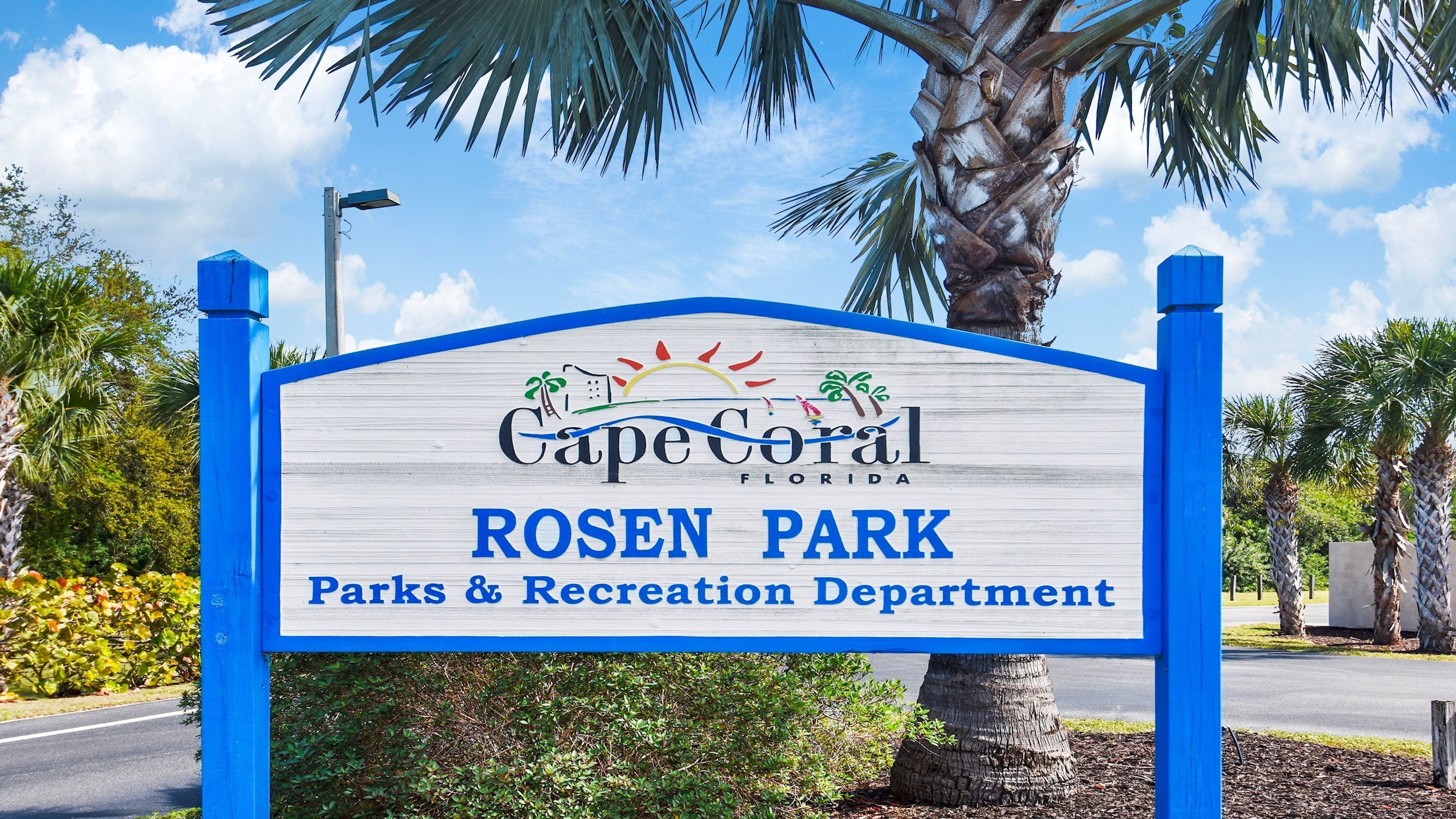 A sign for Cape Coral's Rosen Park Parks & Recreation Department.
