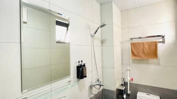 Shower, hair dryer, towels, soap