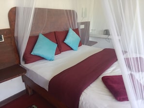 A bed with a canopy, pillows, and a blanket. - Dream Nest Ella (Ella)