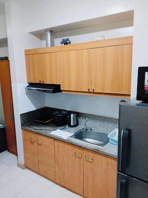 Studio, 1 Bedroom, Patio | Private kitchen - Tranquil Studio Retreat With Shared Pool in Davao City (Davao)