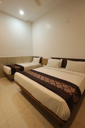 Desk, laptop workspace, blackout curtains, iron/ironing board - Elegant Gold Hotel (Surat)