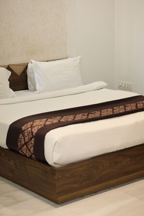 Desk, laptop workspace, blackout curtains, iron/ironing board - Elegant Gold Hotel (Surat)