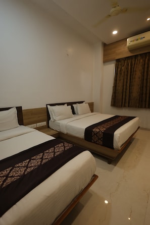 Desk, laptop workspace, blackout curtains, iron/ironing board - Elegant Gold Hotel (Surat)
