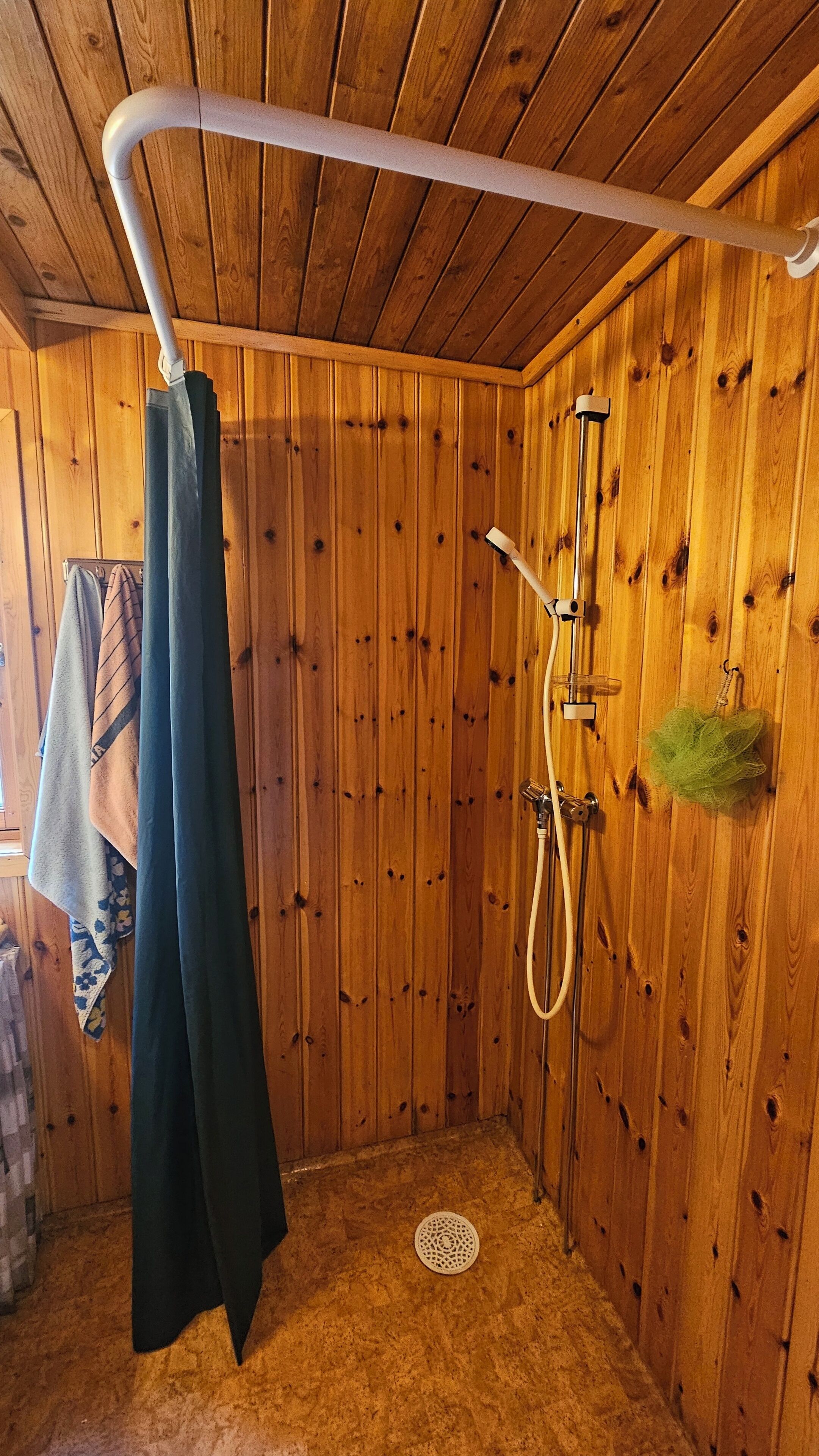 Shower, hair dryer, towels, toilet paper