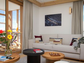 A modern living room with a sofa, a coffee table, and a chessboard. - Bright apartment, open view - 6 guests (Huez)