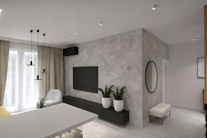 A modern living room with a white sofa, a dining table, pendant lights, a mounted TV, and potted plants. - Margarita by Kairos Apartments (Gliwice)