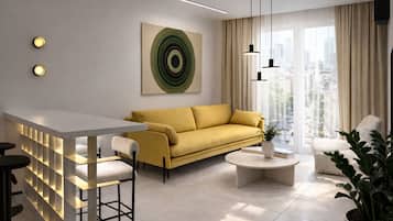 Deluxe Apartment | Living area | 50-inch Smart TV with cable channels, heated floors