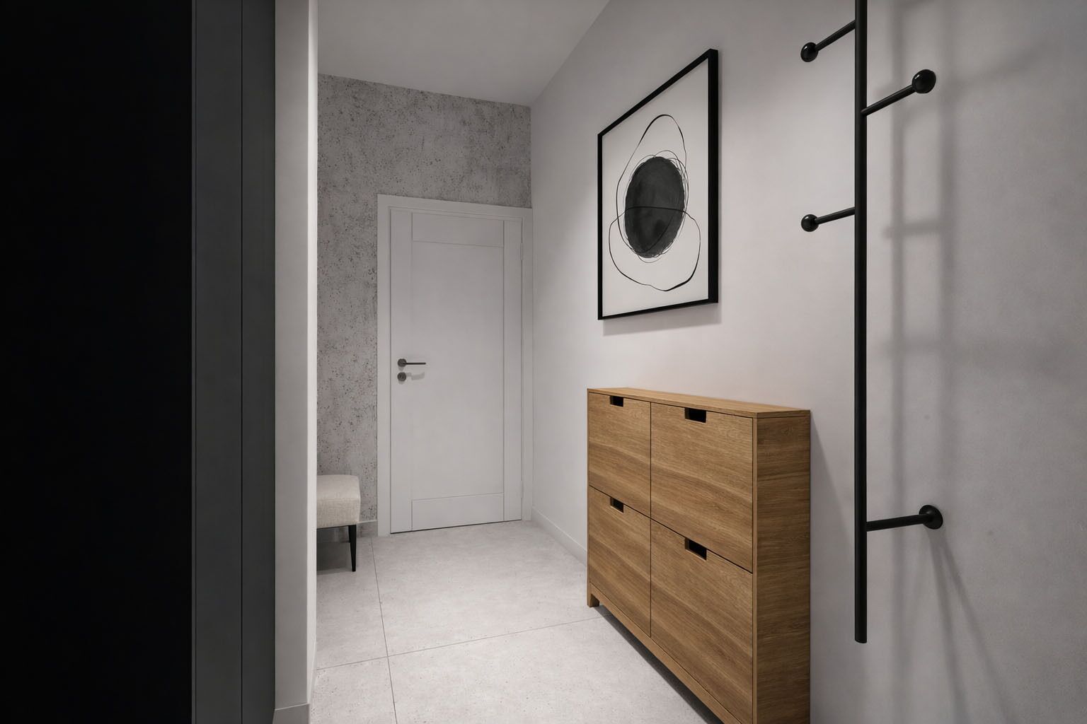 A hallway with a white door, a bench, a wooden cabinet, and a wall-mounted rack.