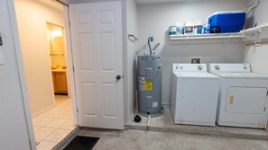 A laundry room with a washing machine, dryer, and a water heater. - 3br Townhome, Steps To Beach, New Remodel Spi 3 Bedroom Townhouse (South Padre Island)
