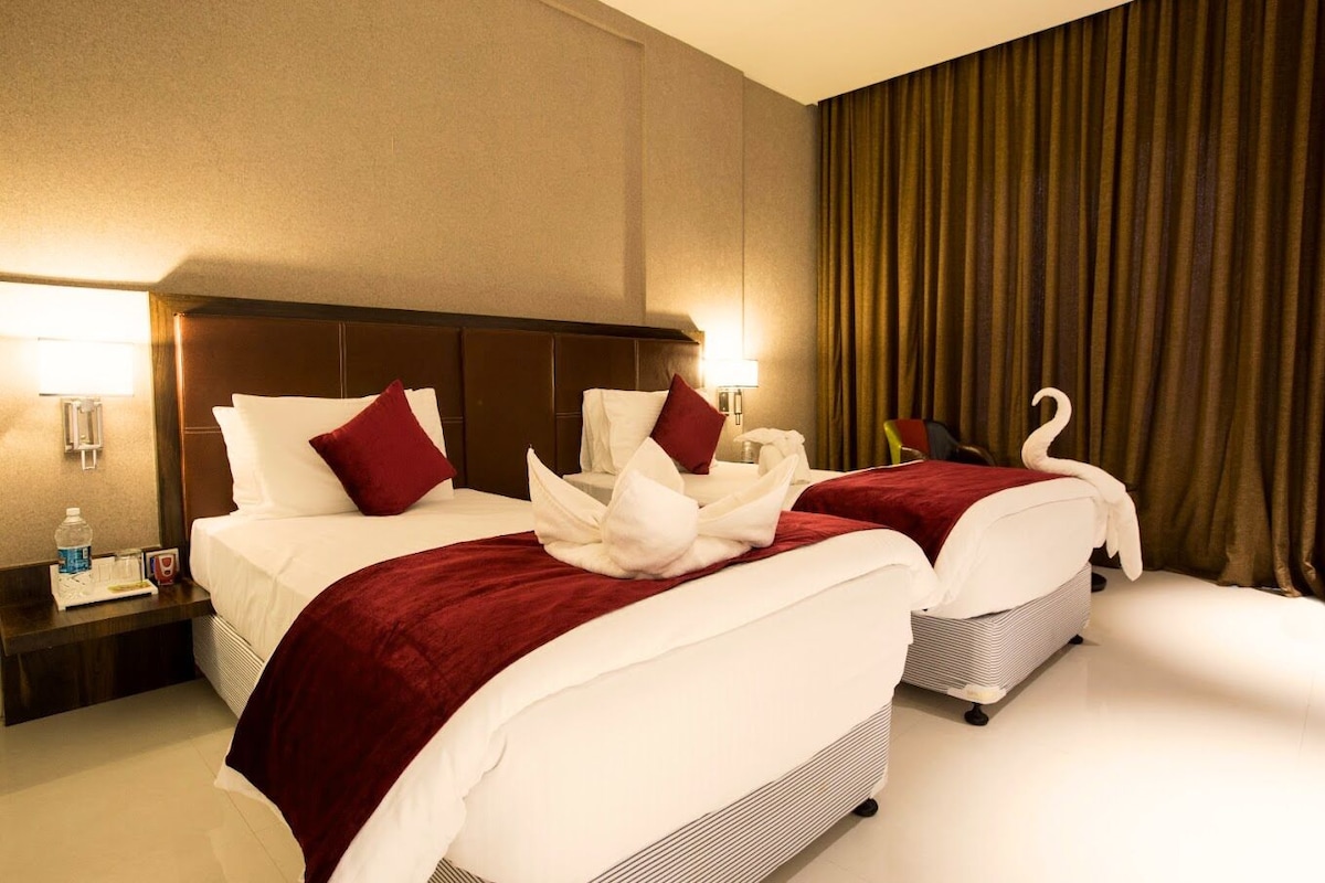 Deluxe Double Room, City View | In-room safe, desk, laptop workspace, iron/ironing board (on request)