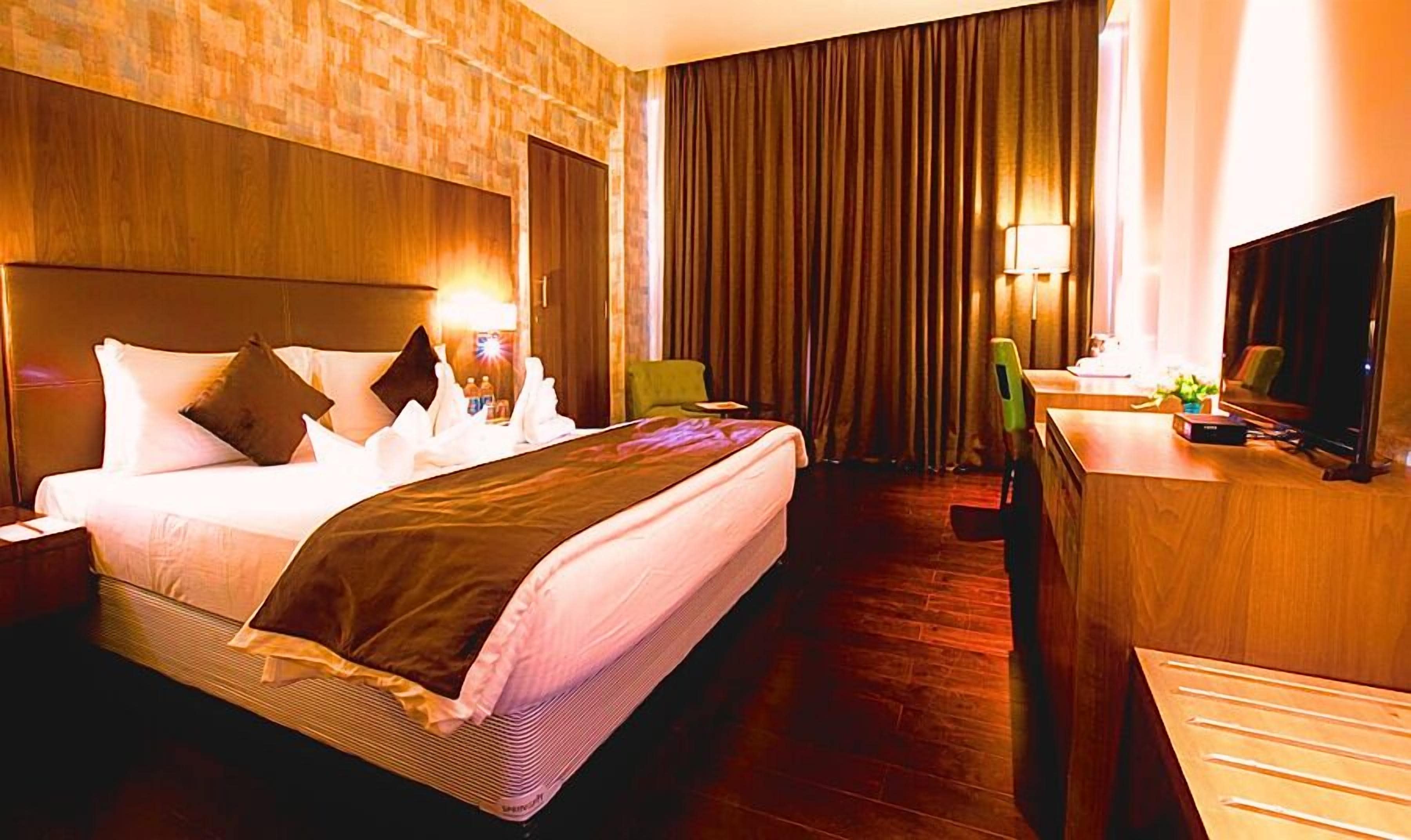Deluxe Double Room, City View | In-room safe, desk, laptop workspace, iron/ironing board (on request)