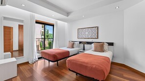 A modern hotel room with two beds, a balcony, and a large window. - Baia da Luz Resort | 2BR with Pool by LovelyStay (Praia da Luz)