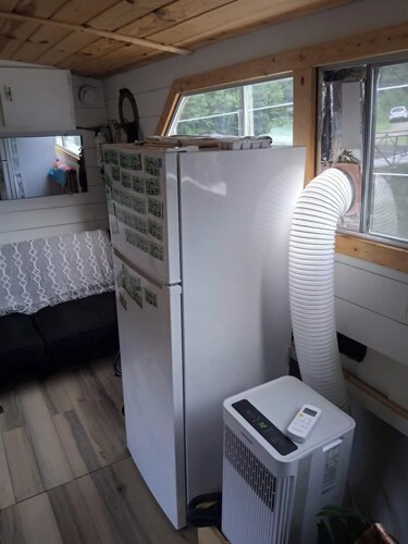 Pet-friendly Camdenton houseboat: swim, fish, and relax in nature.