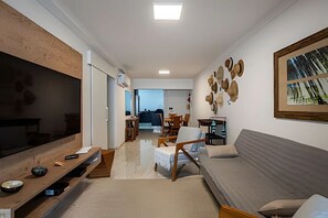Deluxe Apartment, Beach View | Living area - SHB - Estilo e Conforto com Área Gourmet (Guarujá)