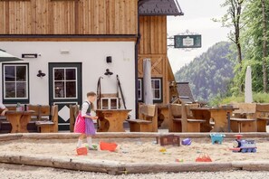 A wooden building with a sign reading "Zloam Hof". - Chalet at the Zlaim Lift With Sauna (Grundlsee)