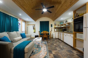 Living area - Cuddy Cabin - Studio Apartment (Rocky Harbour)