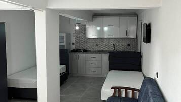 Classic Apartment | Desk, laptop workspace, blackout drapes, iron/ironing board