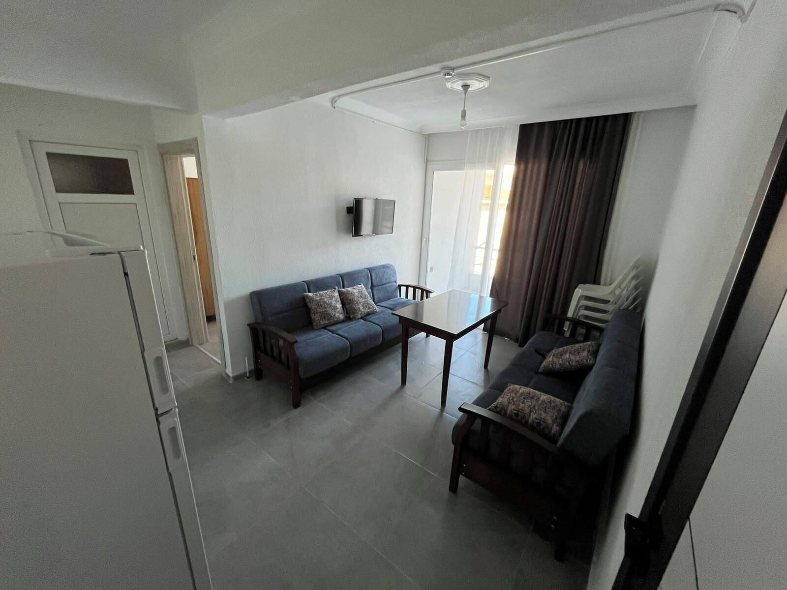 Deluxe Apartment, Balcony, Mountain View | Living area