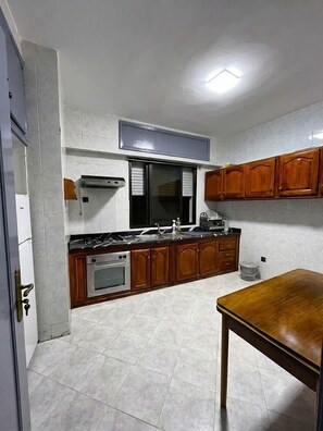 Fridge, cookware/dishes/utensils -  2-bedroom apartment in vibrant Tanger for your stay (Tanger)