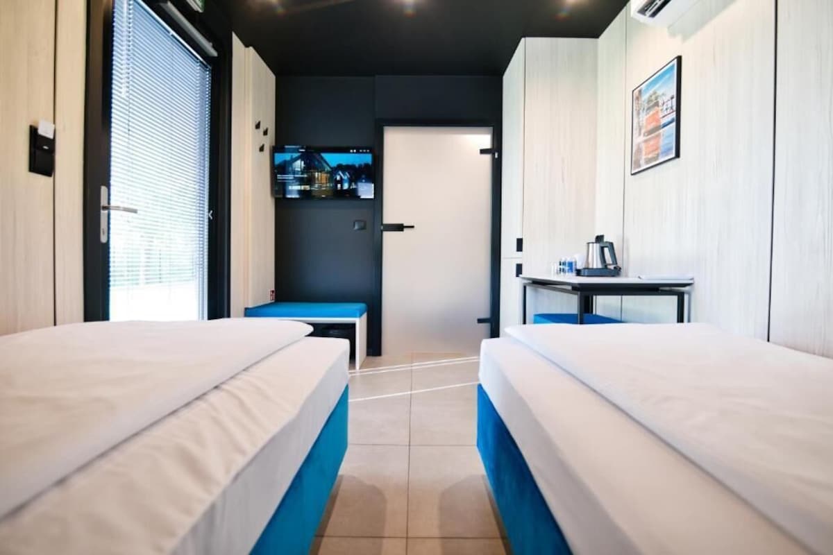 Habitación estándar con 1 cama matrimonial o 2 individuales, vista al patio | Caja de seguridad en la habitación, escritorio y wifi gratis