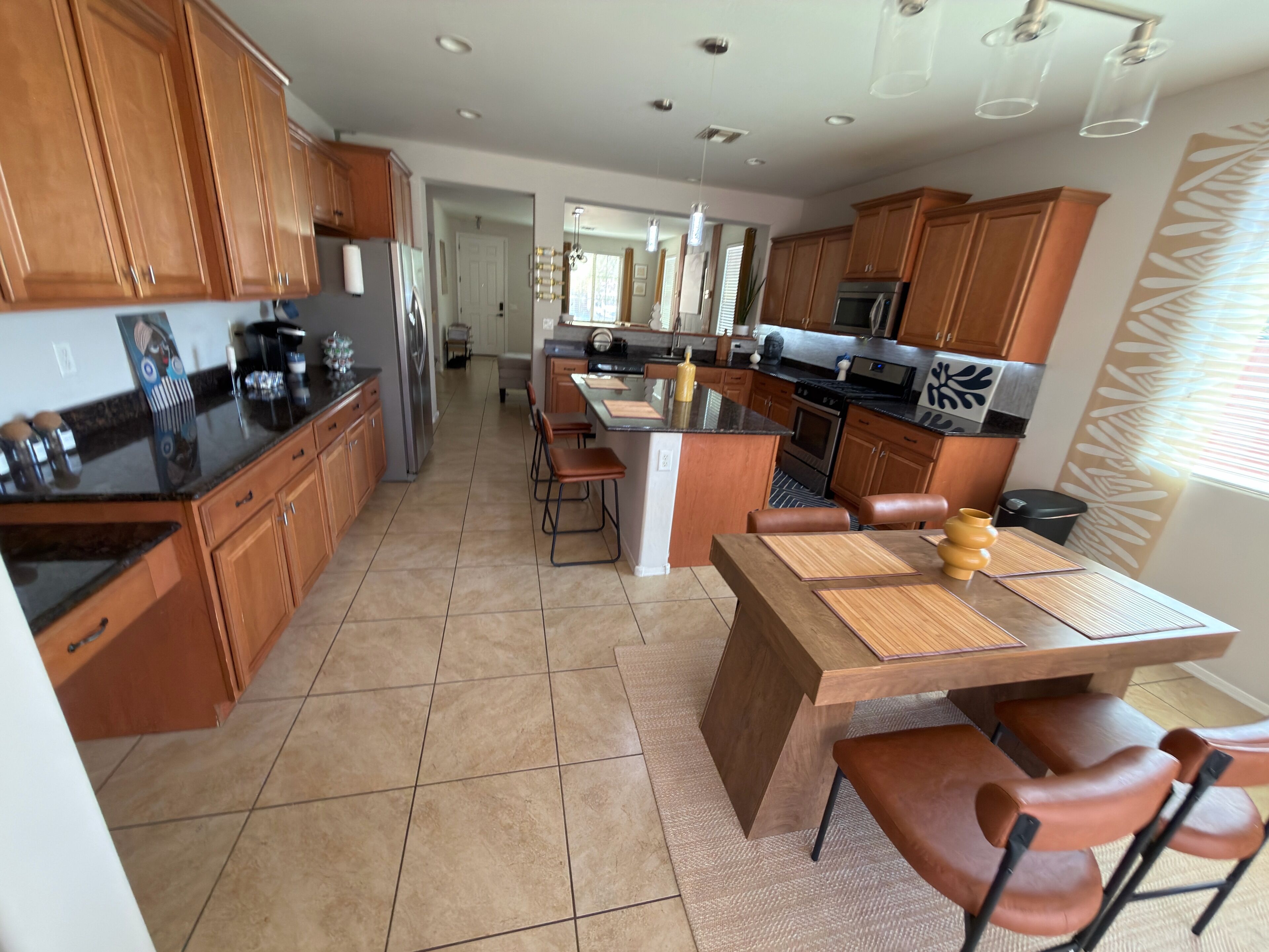 Coffee/tea maker, fridge, microwave, oven
