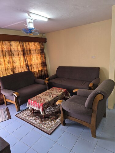Lovely 2-bedroom apartments with AC in vibrant NAsinu
