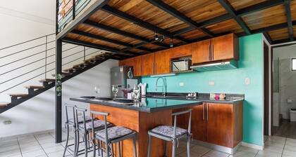 Bright Coco Condo with Loft, Waterfall Pool, AC and Fiber WiFi