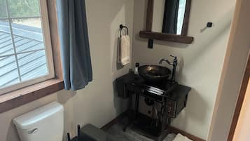 Shower, towels, soap, toilet paper