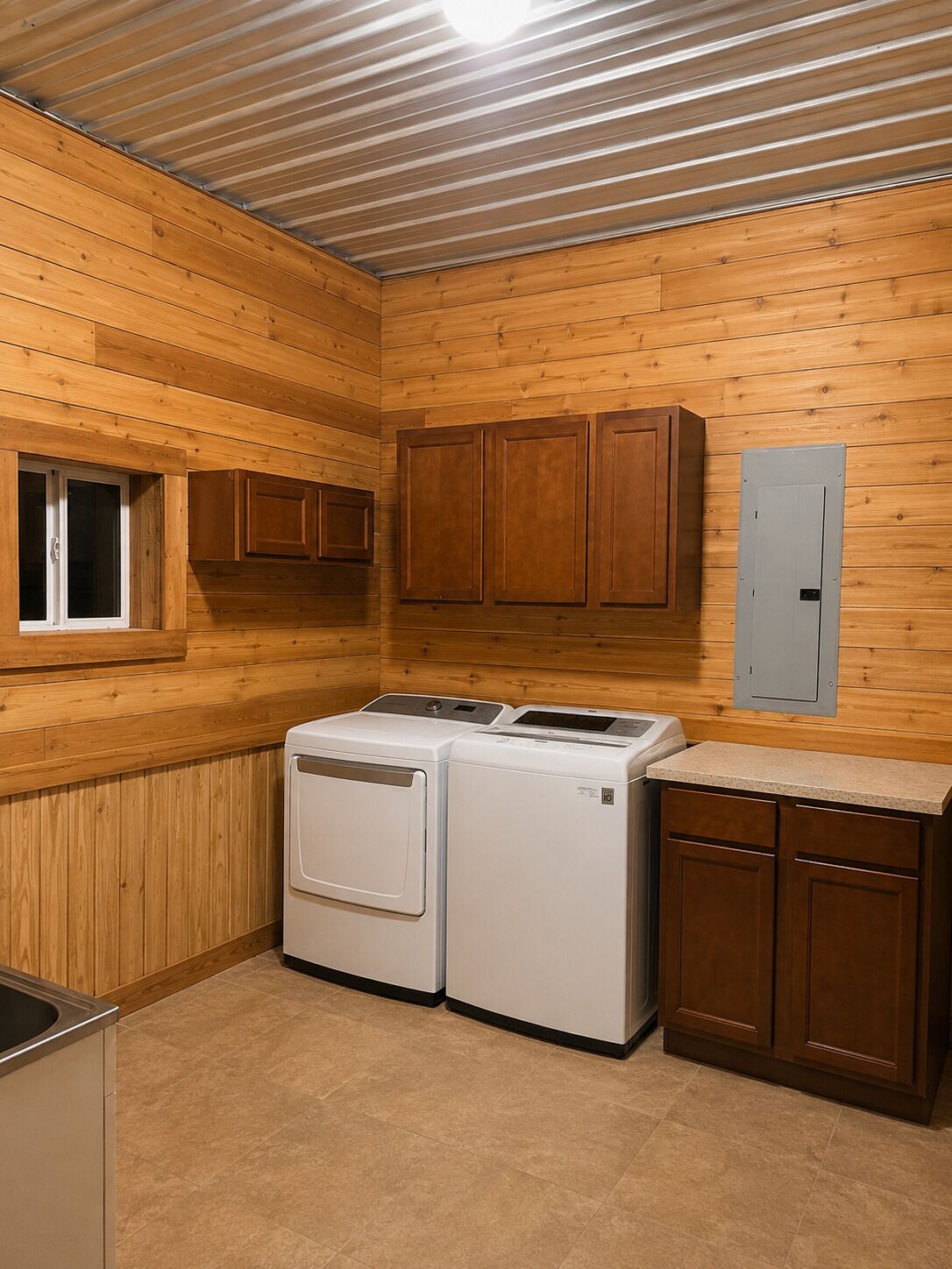 A laundry room with two stacked washers and dryers, wooden cabinets, a window, and a light switch on the wall.