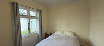 Stay on a real sheep and beef farm with plenty of room for large groups