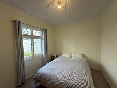 Stay on a real sheep and beef farm with plenty of room for large groups