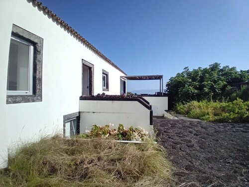 House on the coast of Pico Island. Azores. A warm and intimate atmosphere.