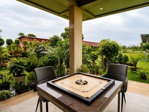 Outdoor dining - Rejuvenating & Expansive Farm Retreat with Private Pool & Lawns (Rishikesh)