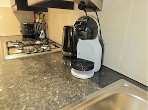 Kaffee und/oder Kaffeemaschine