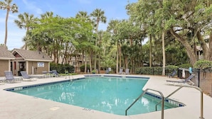 A rectangular swimming pool with a lifeguard station and lounge chairs. - Anchor Down - 2 Bed Beach Fun Dining Golf (Seabrook Island)