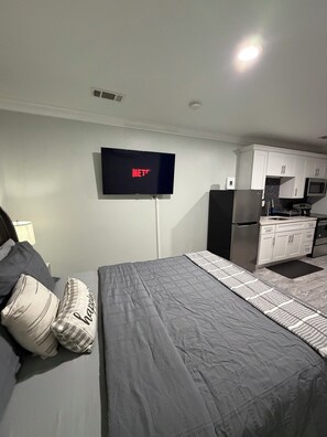 1 habitación, tabla de planchar con plancha, wifi gratis y ropa de cama 
